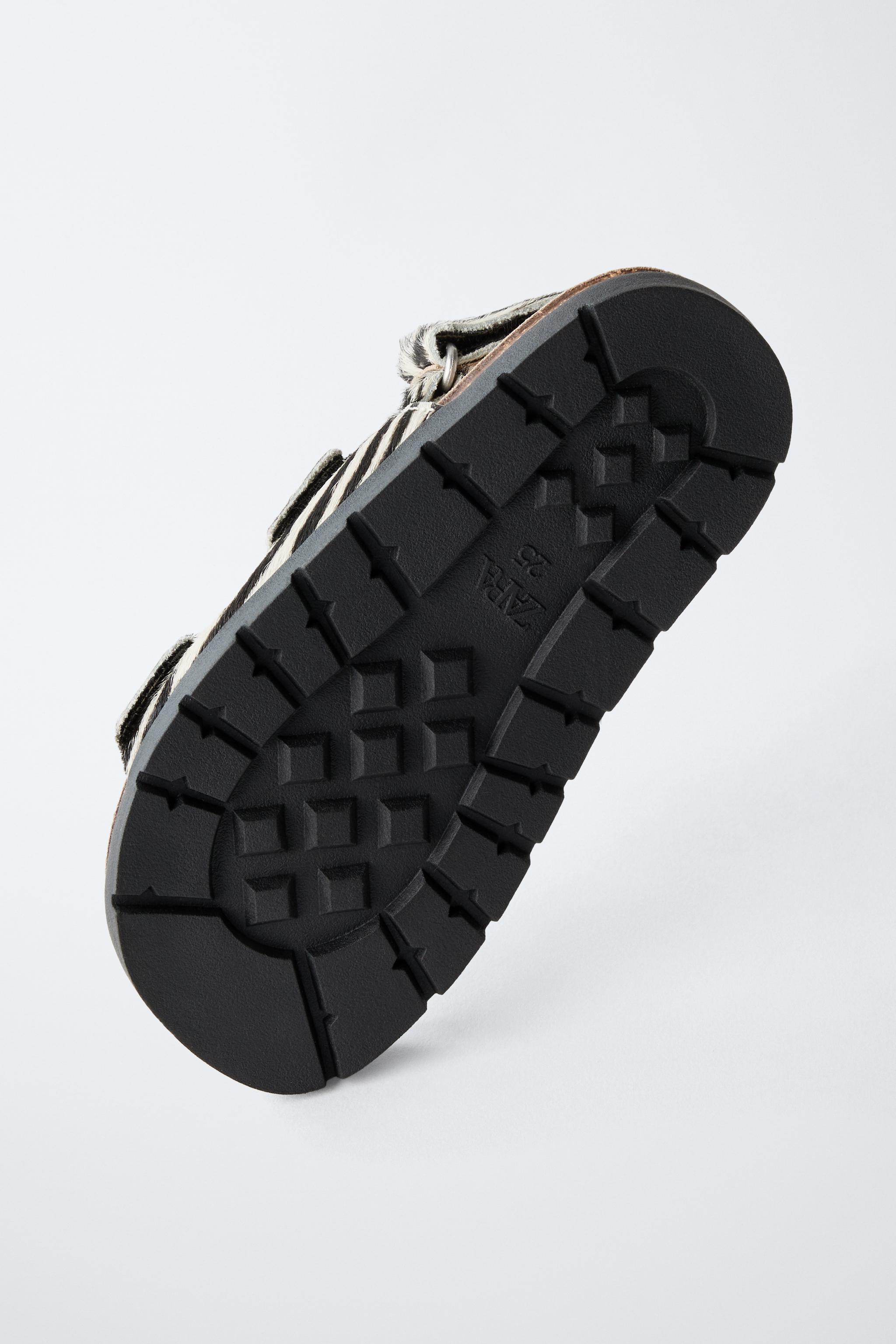 SANDALES EN CUIR IMPRIMÉ ANIMAL